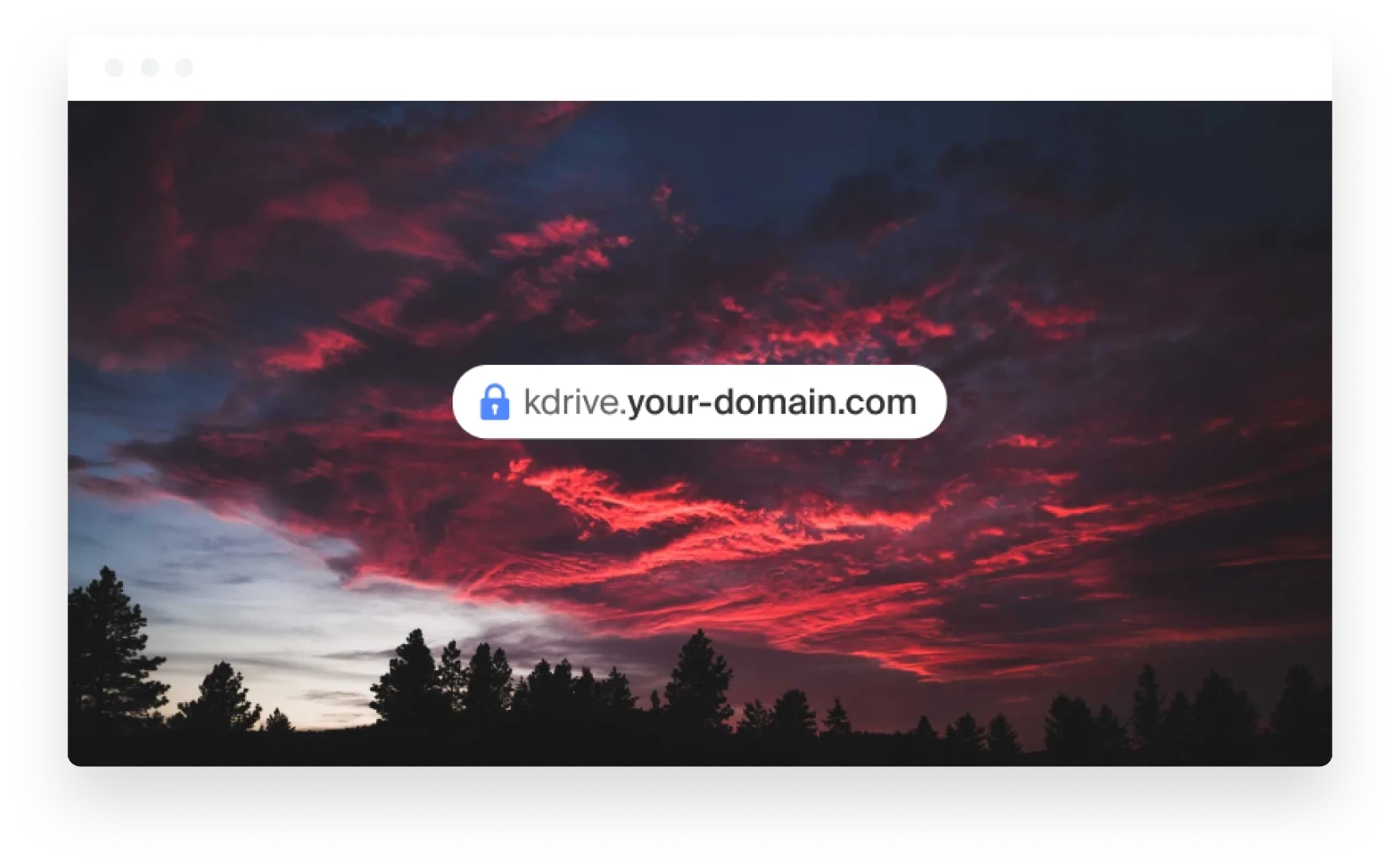 Laptop showing a customised kDrive domain in a browser against a sunset sky.