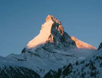 Image of the Matterhorn illuminated by the sun, representing the quality and reliability of a 100% Swiss Cloud, hosted by Infomaniak, compliant with Swiss law and GDPR.