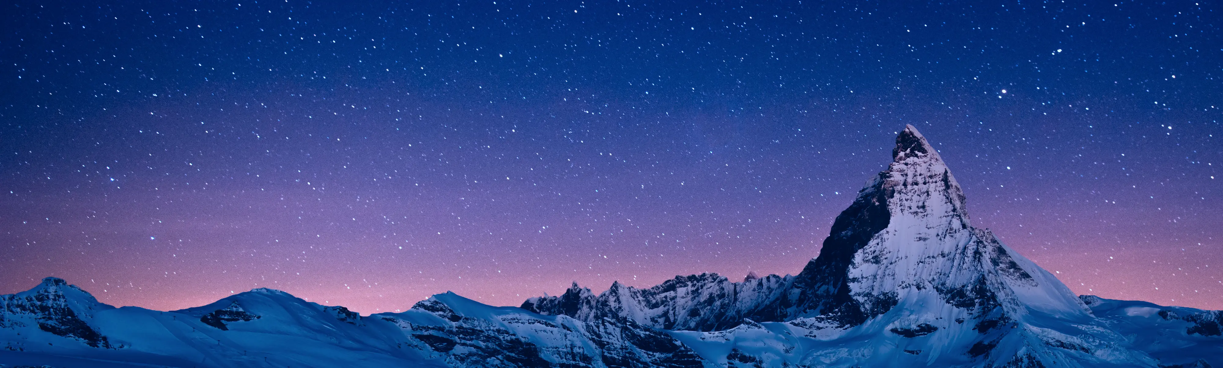 Image of the snow-covered Matterhorn at dawn